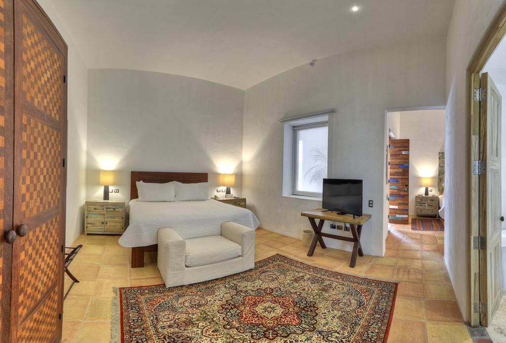 Hotel Boutique Casareyna Puebla Exterior foto A bedroom at the hotel